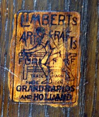 Signed in the drawer with the firms brand:
"Limbert's Arts & Crafts Furniture, made in Grand Rapids and Holland (Michigan)"